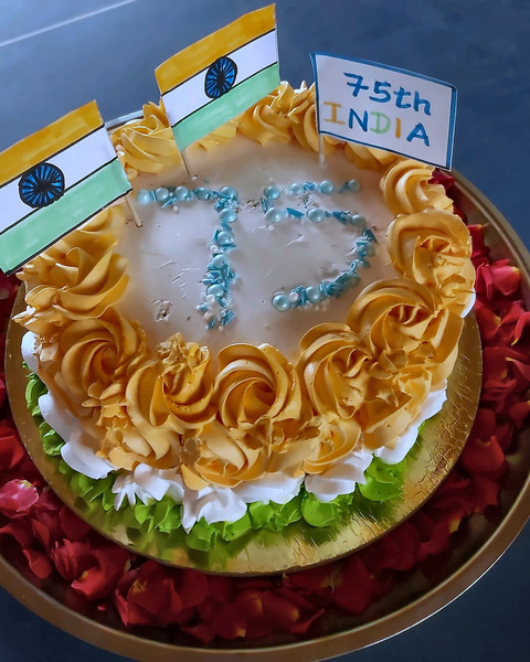 Independence Day cake piped with saffron, white and green rosettes